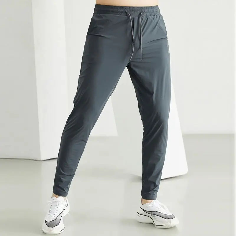 Men Sportswear Jogging Pants Elastic Running Sweatpants Gym Fitness Tight Trousers Quick Dry Tracksuit Training Sport Pants