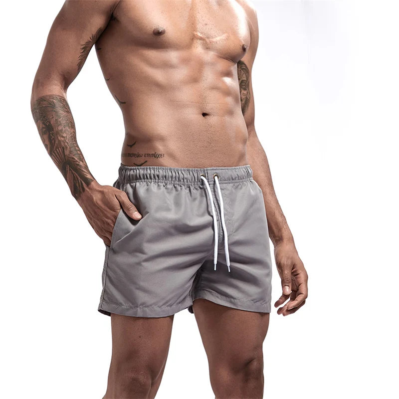 Mens Swim Trunks with Mesh Lining Side Pockets Solid Beach Shorts Quick Dry Lightweight Drawstring Board Shorts Summer Swimwear