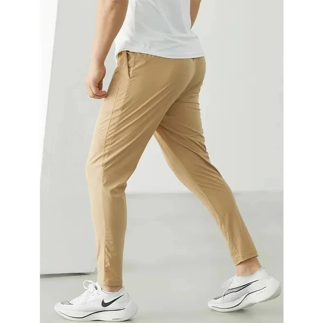 Running Pants Men Sportswear Elastic Jogging Sweatpants Gym Fitness Tight Trousers Quick Dry Thin Tracksuit Training Sport Pants