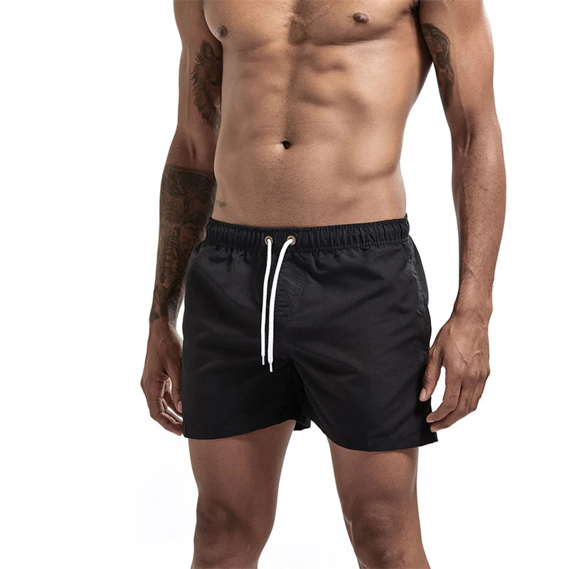 Mens Swim Trunks with Mesh Lining Side Pockets Solid Beach Shorts Quick Dry Lightweight Drawstring Board Shorts Summer Swimwear