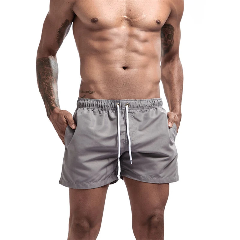 Mens Swim Trunks with Mesh Lining Side Pockets Solid Beach Shorts Quick Dry Lightweight Drawstring Board Shorts Summer Swimwear