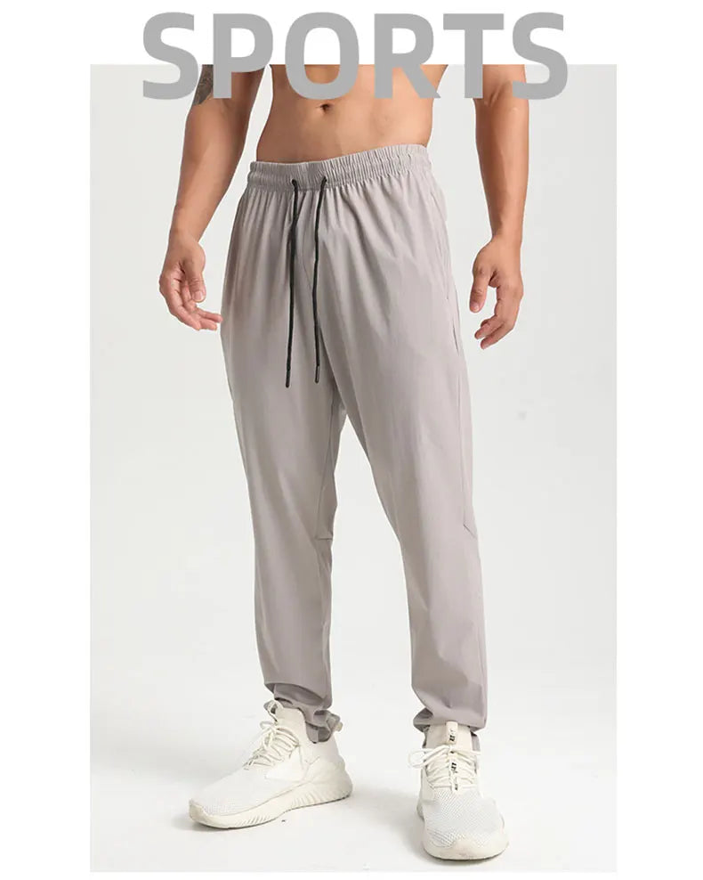 Men Gym Jogging Sport Pants Thin Loose Quick-Dry Long Exercise Clothing Zipper Pockets Training Bodybuilding Trouser Marathon