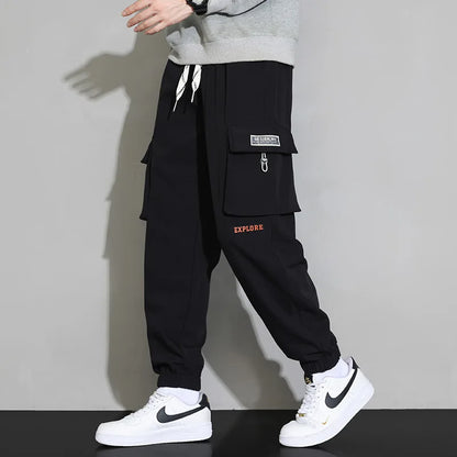 Streetwear Spring Harem Casual Pants Men Elastic Waist Solid Color Cargo Pants Multi Pocket Loose Baggy Pants For Men