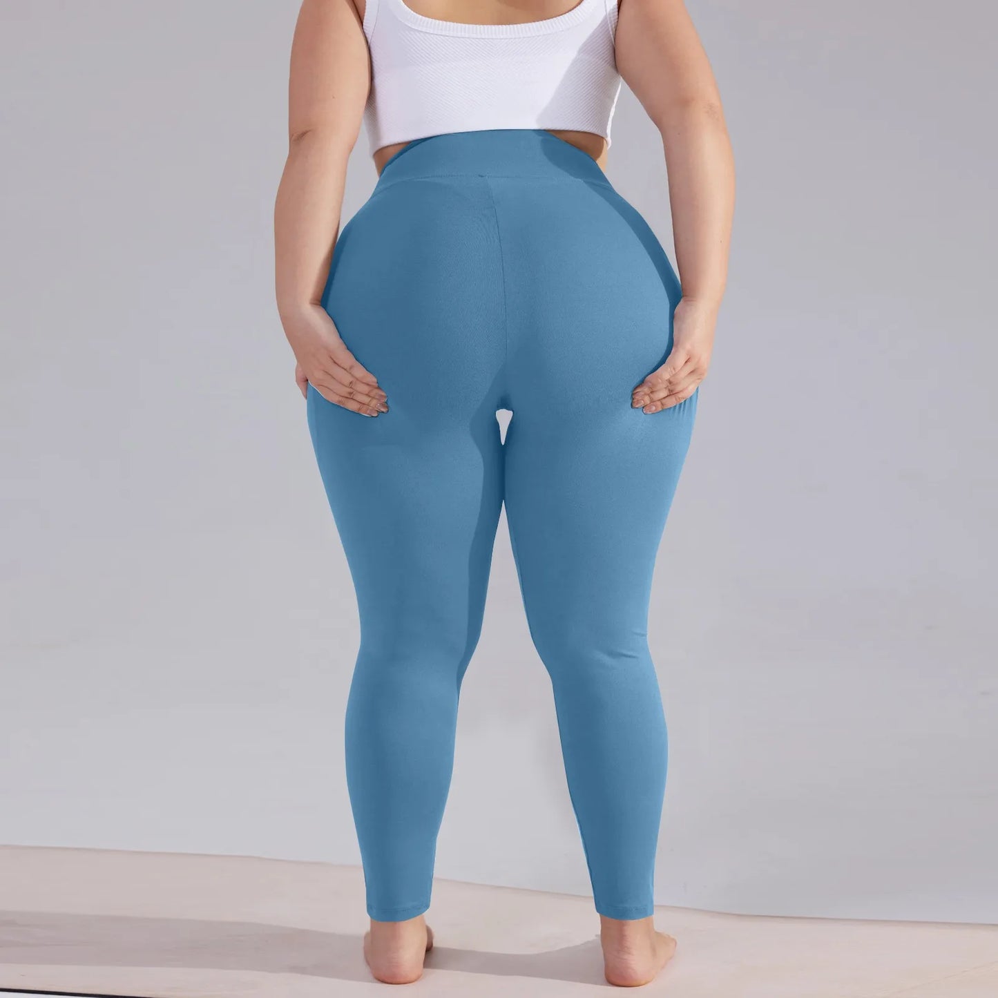 Plus size yoga pants women high waisted hip lift athletic leggings slim sports capri pants with pockets solid color sweatpants