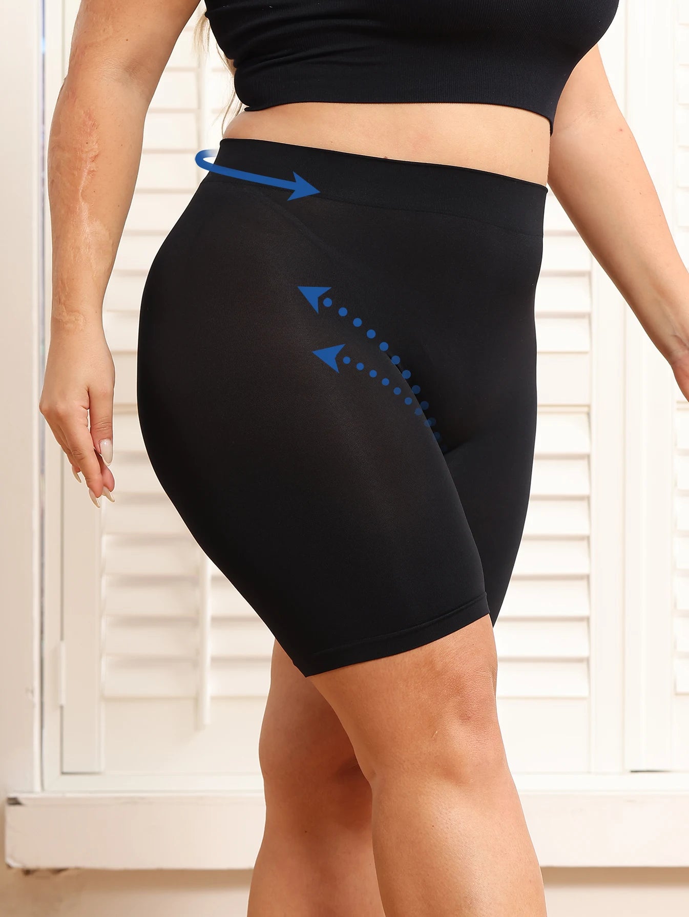 Plus-size women's shorts with tummy control and butt-lifting features to prevent exposure and provide safety shorts.