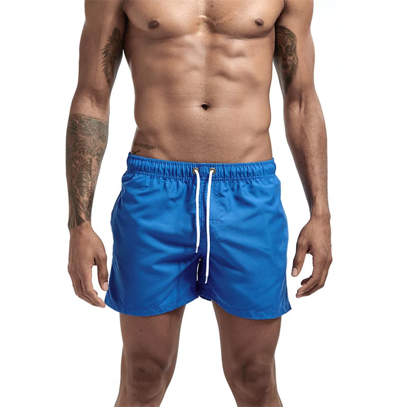 Mens Swim Trunks with Mesh Lining Side Pockets Solid Beach Shorts Quick Dry Lightweight Drawstring Board Shorts Summer Swimwear
