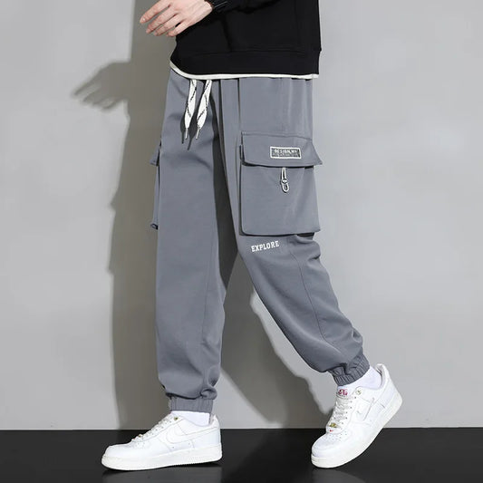 Streetwear Spring Harem Casual Pants Men Elastic Waist Solid Color Cargo Pants Multi Pocket Loose Baggy Pants For Men