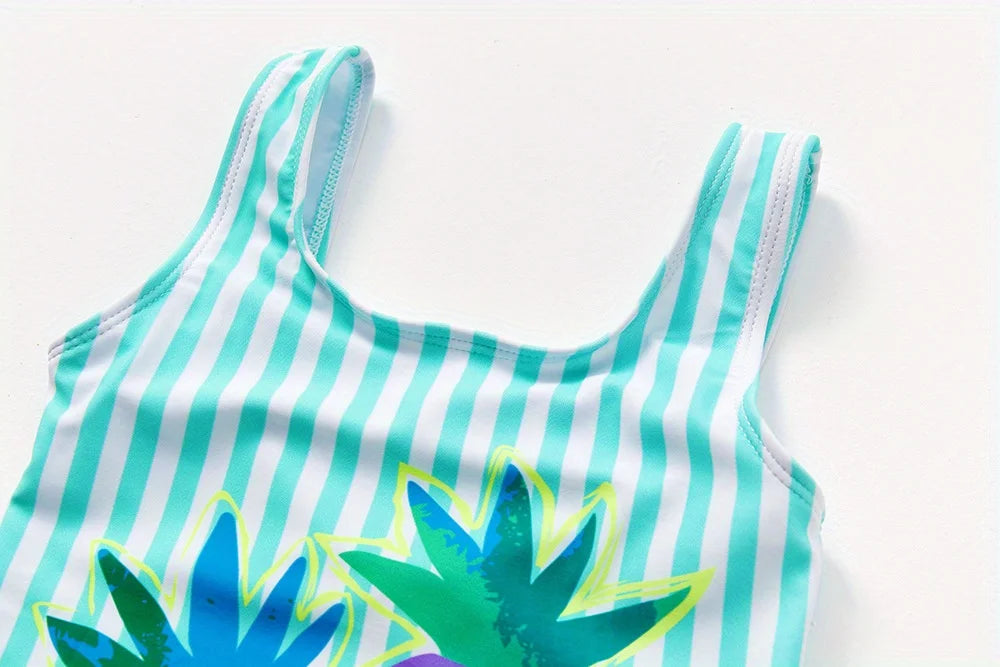 A girl's swimsuit with a fruit pattern, suitable for children aged 2-11. Chest Pad