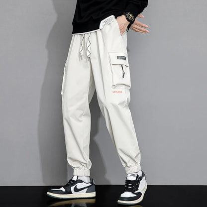 Streetwear Spring Harem Casual Pants Men Elastic Waist Solid Color Cargo Pants Multi Pocket Loose Baggy Pants For Men