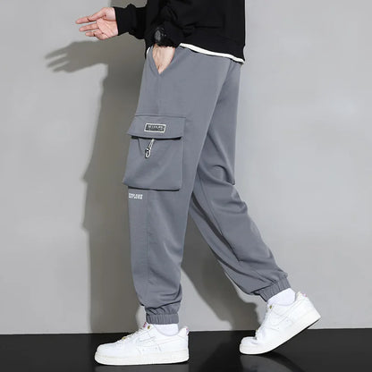 Streetwear Spring Harem Casual Pants Men Elastic Waist Solid Color Cargo Pants Multi Pocket Loose Baggy Pants For Men