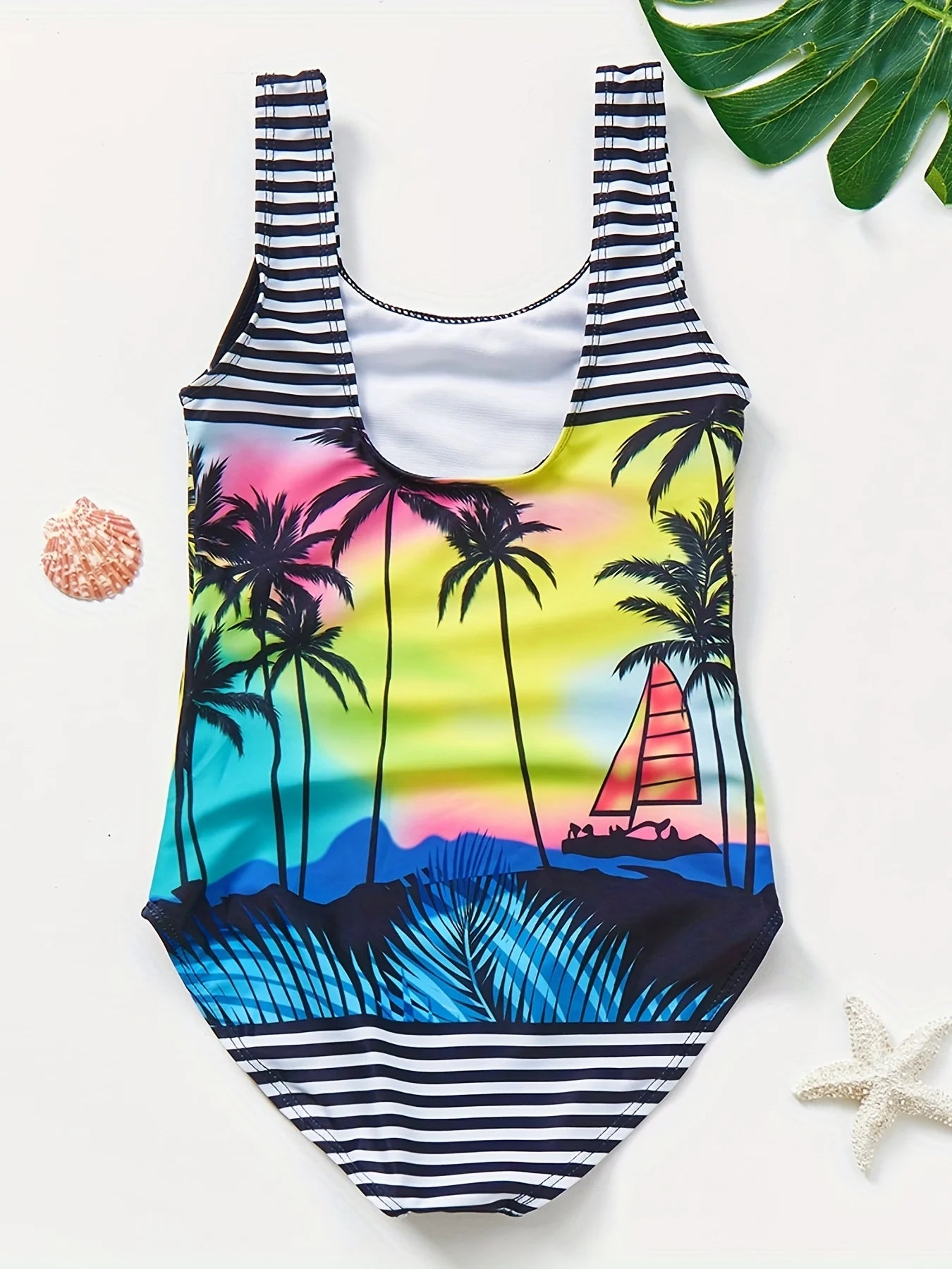 A girl's swimsuit with a fruit pattern, suitable for children aged 2-11. Chest Pad