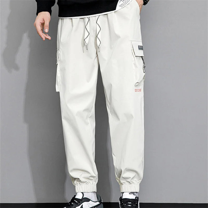Streetwear Spring Harem Casual Pants Men Elastic Waist Solid Color Cargo Pants Multi Pocket Loose Baggy Pants For Men