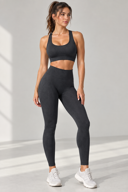 Model wearing black sports bra and leggings set