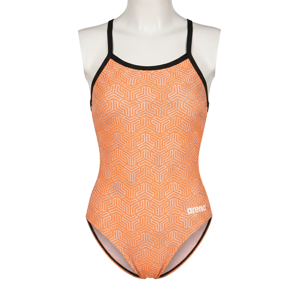 Peach geometric swimsuit with black trim, studio view